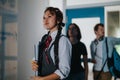 Confident students walking in university corridor after class outdoors Royalty Free Stock Photo