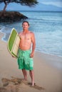 Confident Surfer at Shoreline Royalty Free Stock Photo