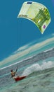 Surfing man & Euro as kite, sail Royalty Free Stock Photo