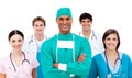 Confident surgeon with his team in the background Royalty Free Stock Photo