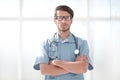 confident surgeon man in blue uniform