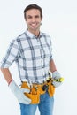 Confident technician holding spirit level Royalty Free Stock Photo