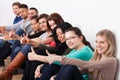 Confident University Students Sitting In A Row Royalty Free Stock Photo