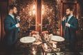 Confident well-dressed man in Luxury bathroom interior.