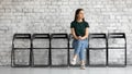 Confident woman candidate waiting for job interview in empty hall Royalty Free Stock Photo