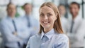 Confident woman posing in front of his colleague during a meeting Royalty Free Stock Photo