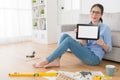 Confident woman right sitting on wooden floor Royalty Free Stock Photo