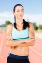 Confident woman standing with arms crossed Royalty Free Stock Photo