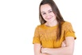 Confident woman young caucasian woman in yellow shirt casually standing