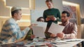 Woman presenting business strategy to men colleagues in office boardroom closeup Royalty Free Stock Photo