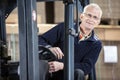 Confident Worker In Forklift At Warehouse Royalty Free Stock Photo