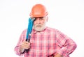 Confident worker. man builder with adjustable pipe wrench. build and construction. professional repairman in helmet with Royalty Free Stock Photo