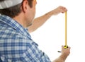 Confident worker measuring dimensions Royalty Free Stock Photo