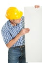 Confident worker presenting empty board Royalty Free Stock Photo