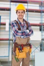 Confident worker wearing toolbelt Royalty Free Stock Photo