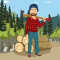 Confident young bearded lumberjack man holding big axe on shoulder in forest