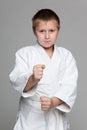 Confident young boy in kimono Royalty Free Stock Photo