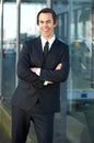 Confident young business man smiling outdoors Royalty Free Stock Photo