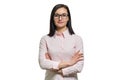 Confident young business woman with crossed arms in glasses pink shirt on white isolated background