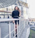 Confident young business woman standing near modern office building. Royalty Free Stock Photo