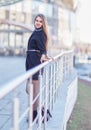 Confident young business woman standing near modern office building. Royalty Free Stock Photo