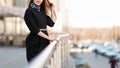 Confident young business woman standing near modern office building. Royalty Free Stock Photo