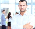 Confident young businessman standing arms crossed Royalty Free Stock Photo