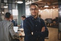 Confident young businessman working in a modern office Royalty Free Stock Photo