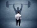 Businessman with weight lifting shadow Royalty Free Stock Photo