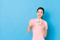 Confident young girl holding quit smoking symbol Royalty Free Stock Photo