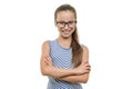 Confident young girl student in glasses with arms crossed smiling on white background, isolated Royalty Free Stock Photo