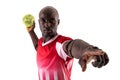 Confident young male african american male handball player throwing ball against white background Royalty Free Stock Photo