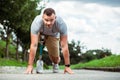 Confident young man with disability standing on the track Royalty Free Stock Photo