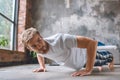 confident young man doing push ups during morning time Royalty Free Stock Photo