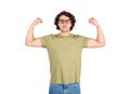 Confident young man flexing muscles imagine superpower. Strong guy wears eyeglasses shows his strength, serious face expression