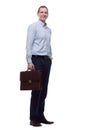 Confident young man with a leather briefcase. isolated on a white Royalty Free Stock Photo