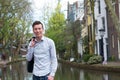 Confident young man smiling outdoors Royalty Free Stock Photo