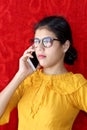 Confident young woman talking on phone Royalty Free Stock Photo