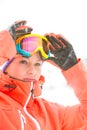 Confident young woman wearing ski goggles outdoors Royalty Free Stock Photo