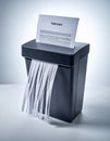 Confidential Document Being Shredded for Security (1 Royalty Free Stock Photo