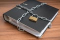 Confidential files and documents in binder locked with padlock and chain. Privacy and security concept. Royalty Free Stock Photo