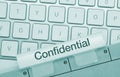 Confidential - Inscription on Blue Keyboard Key