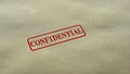 Confidential seal stamped on blank paper background, personal data nondisclosure Royalty Free Stock Photo