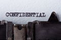 Confidential - word typed on old typewriter