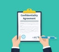 Confidentiality agreement. Man hold information consent. Pen in hand signing papers. Clipboard with documents in the Royalty Free Stock Photo