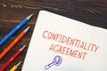 Confidentiality Agreement phrase on the piece of paper