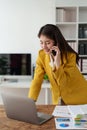 Confidently Asian business woman smiling and talking with mobile phone. Secretary checking schedule at front of boss