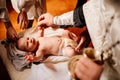 Confirmation. infant baby at the ritual of baptism in the Orthodox Church.