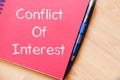 Conflict of interest write on notebook Royalty Free Stock Photo