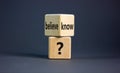 Conflict of knowing or believing. Wooden cubes with words `believe` and `know`. Beautiful grey background. Copy space. Concept Royalty Free Stock Photo